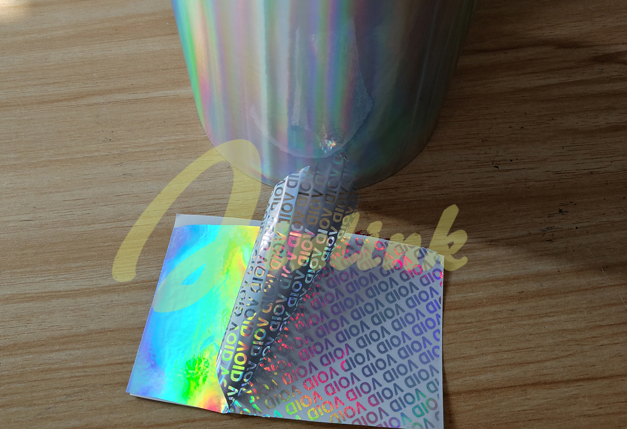 Total transfer tamper evident holographic laser label material with Low residue 
